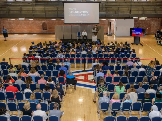 View from above, NSCS graduates in Bear Down Gym