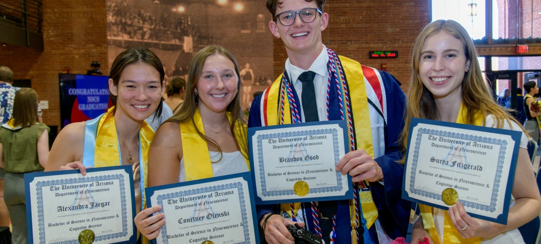In order from left to right; Alexandra Jaeger, Courtney Olenski, Brandon Good, & Surya Fitzgerald showing off their recently received diplomas.